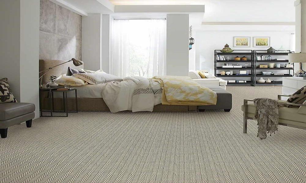 Can wall-to-wall carpets be installed over existing flooring?